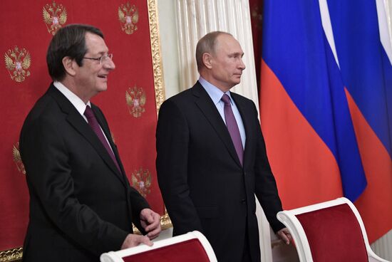 Russian President Vladimir Putin meets with President of Cyprus Nicos Anastasiades