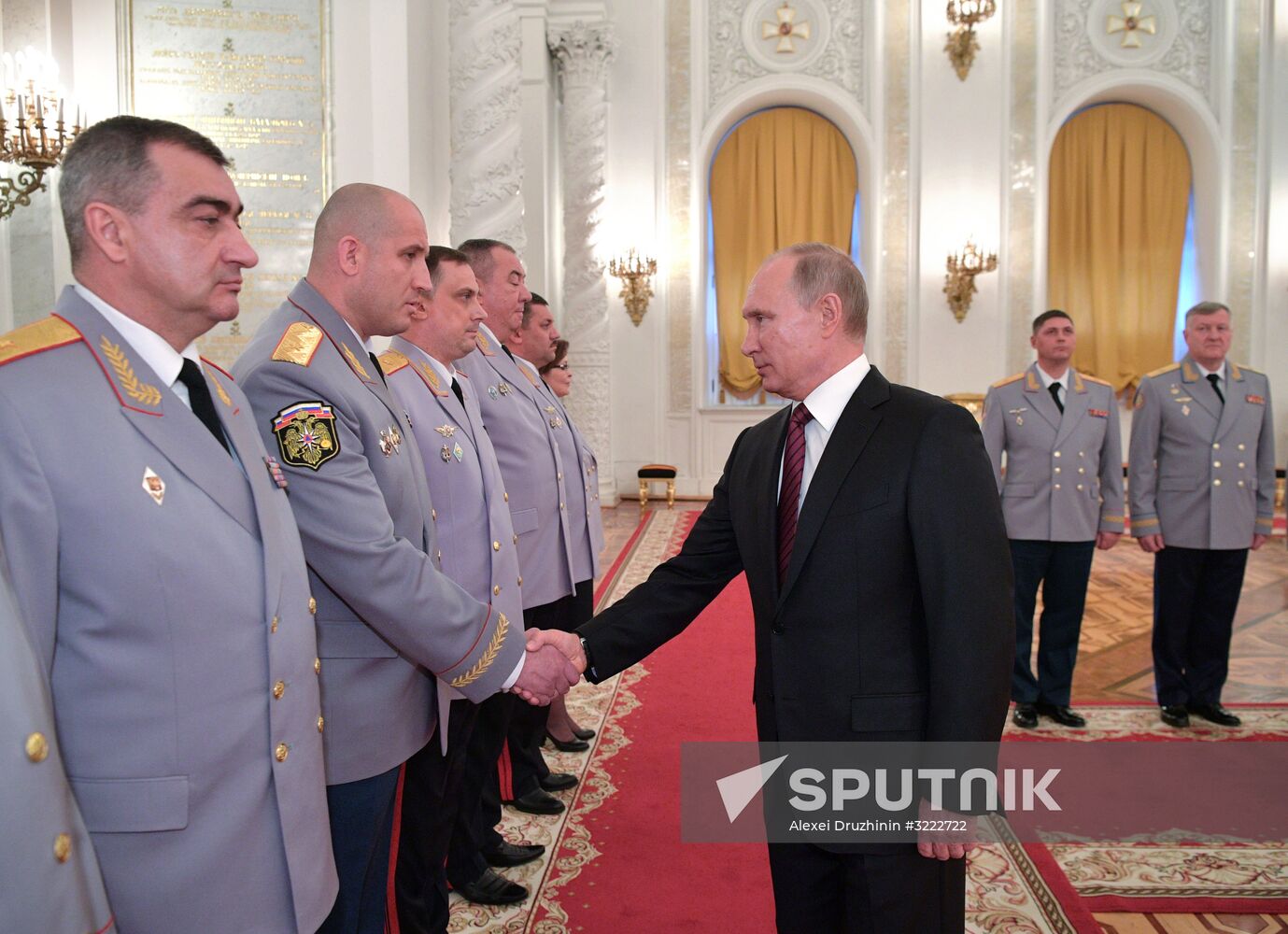 Russian President Vladimir Putin meets with senior officers at the Kremlin