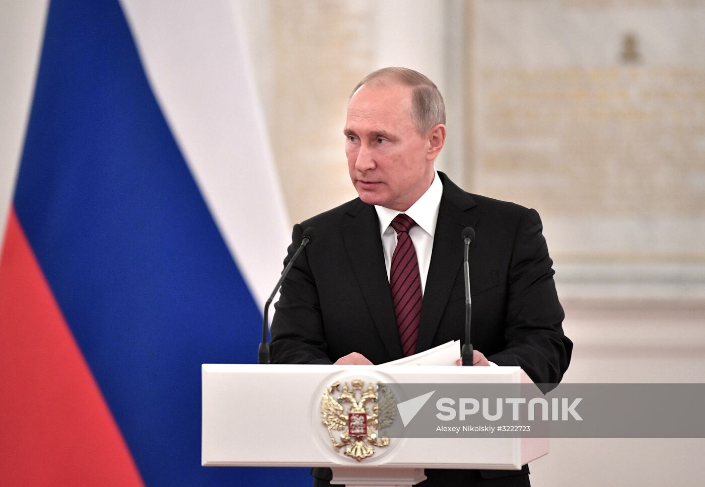 Russian President Vladimir Putin meets with senior officers at the Kremlin