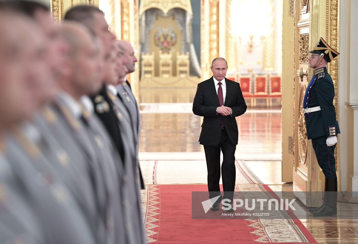 Russian President Vladimir Putin meets with senior officers at the Kremlin