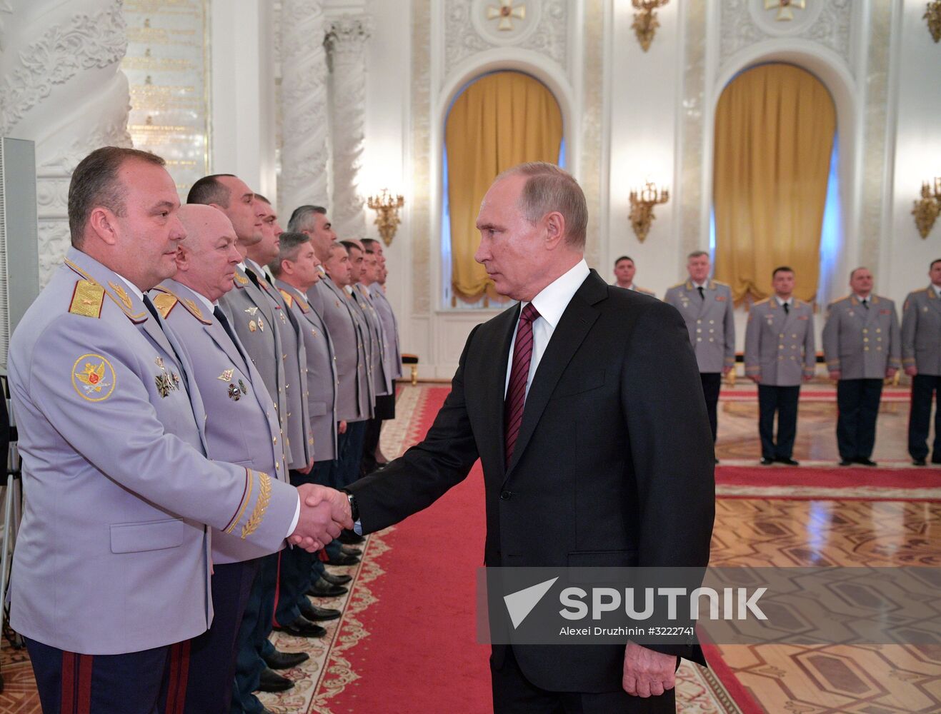 Russian President Vladimir Putin meets with senior officers at the Kremlin