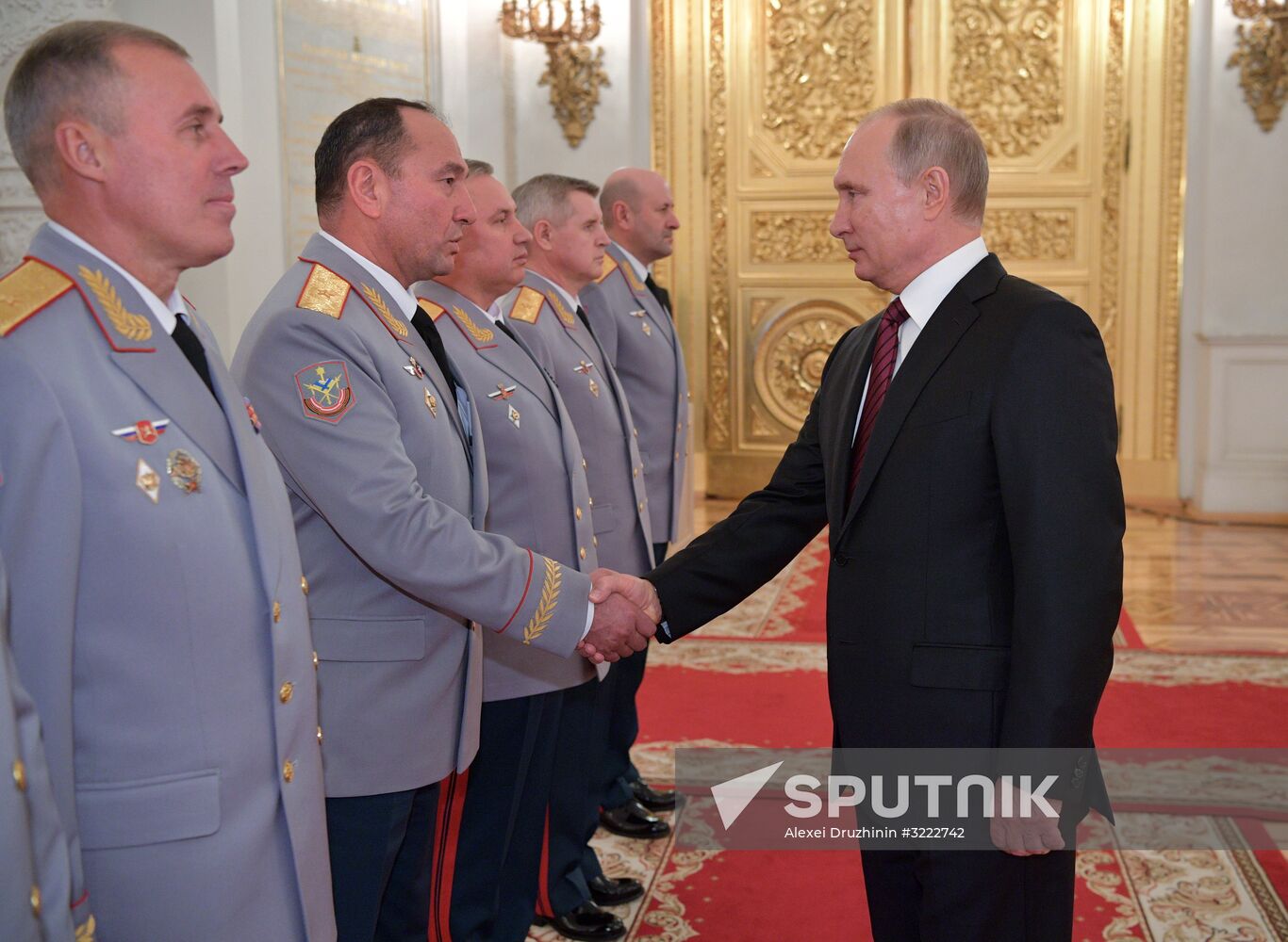 Russian President Vladimir Putin meets with senior officers at the Kremlin