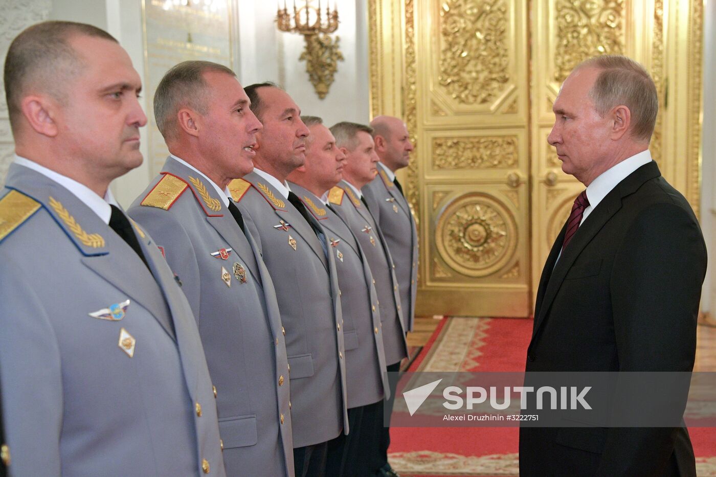 Russian President Vladimir Putin meets with senior officers at the Kremlin