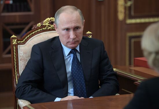 President Vladimir Putin meets with Deputy Prime Minister Olga Golodets