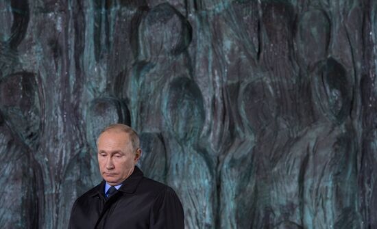 President Vladimir Putin attends unveiling of the Wall of Grief memorial