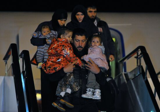 Welcoming Russian children, rescued in Syria, at Grozny Airport