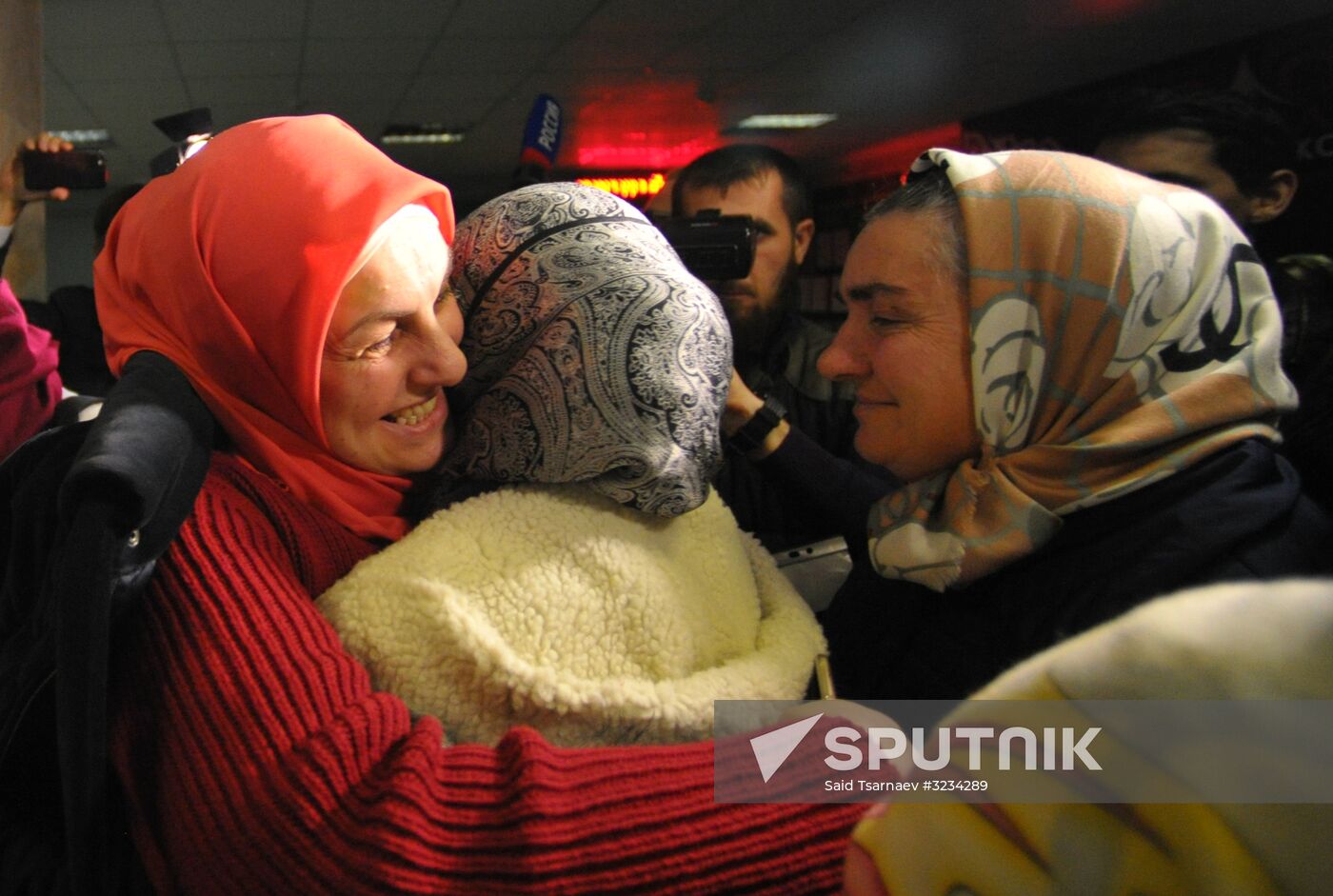Welcoming Russian children, rescued in Syria, at Grozny Airport