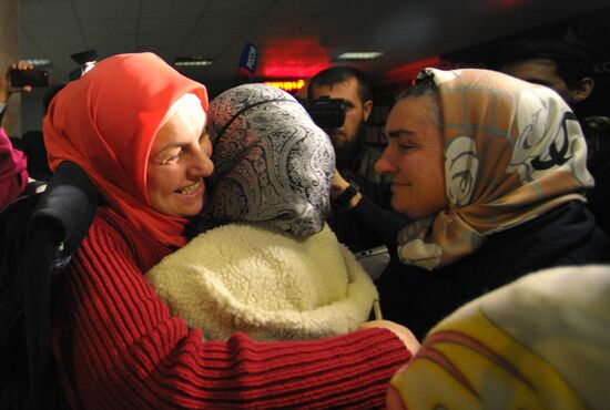 Welcoming Russian children, rescued in Syria, at Grozny Airport