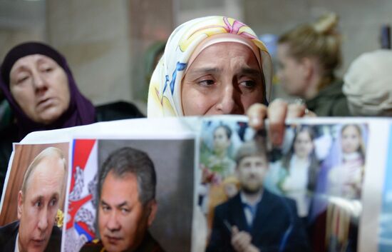 Welcoming Russian children, rescued in Syria, at Grozny Airport