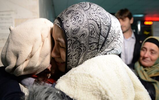 Welcoming Russian children, rescued in Syria, at Grozny Airport