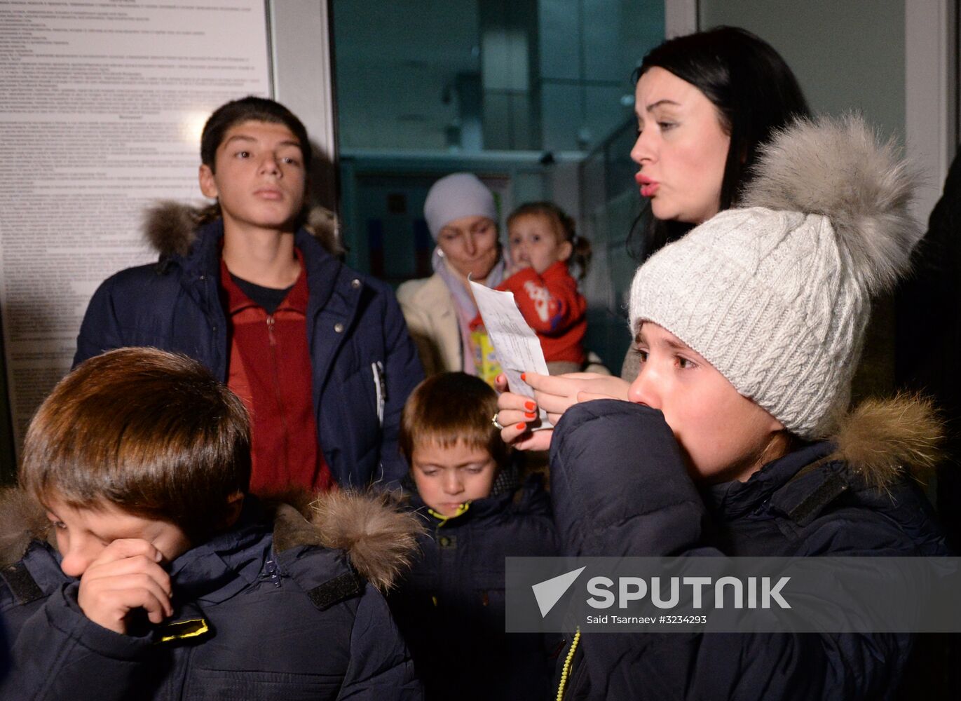 Welcoming Russian children, rescued in Syria, at Grozny Airport