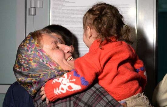 Welcoming Russian children, rescued in Syria, at Grozny Airport