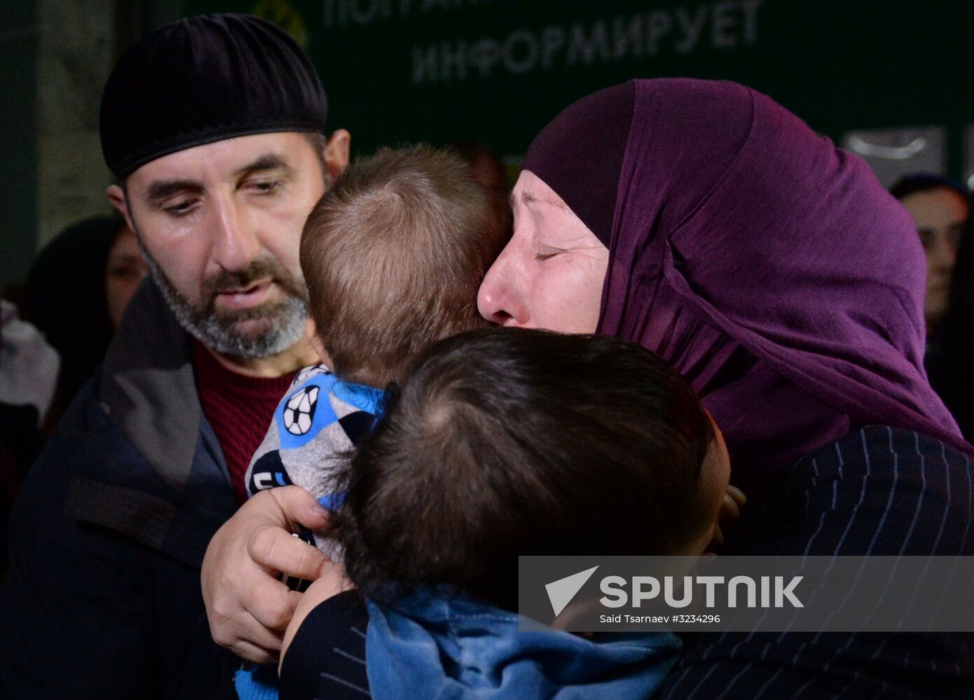 Welcoming Russian children, rescued in Syria, at Grozny Airport