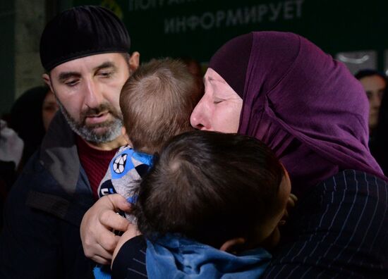 Welcoming Russian children, rescued in Syria, at Grozny Airport