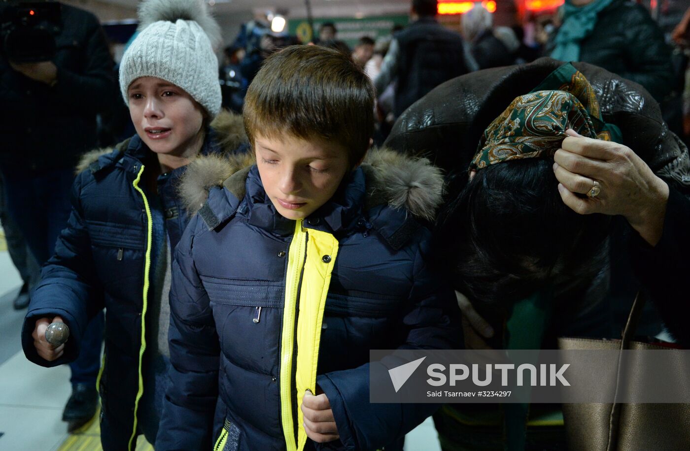 Welcoming Russian children, rescued in Syria, at Grozny Airport