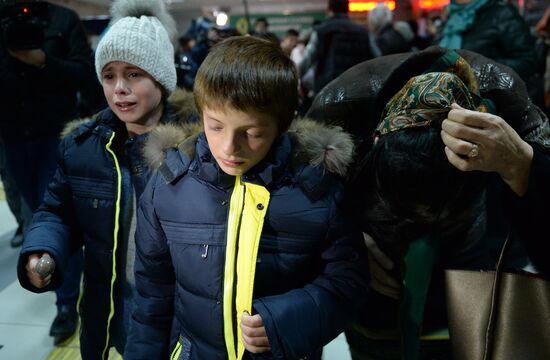 Welcoming Russian children, rescued in Syria, at Grozny Airport