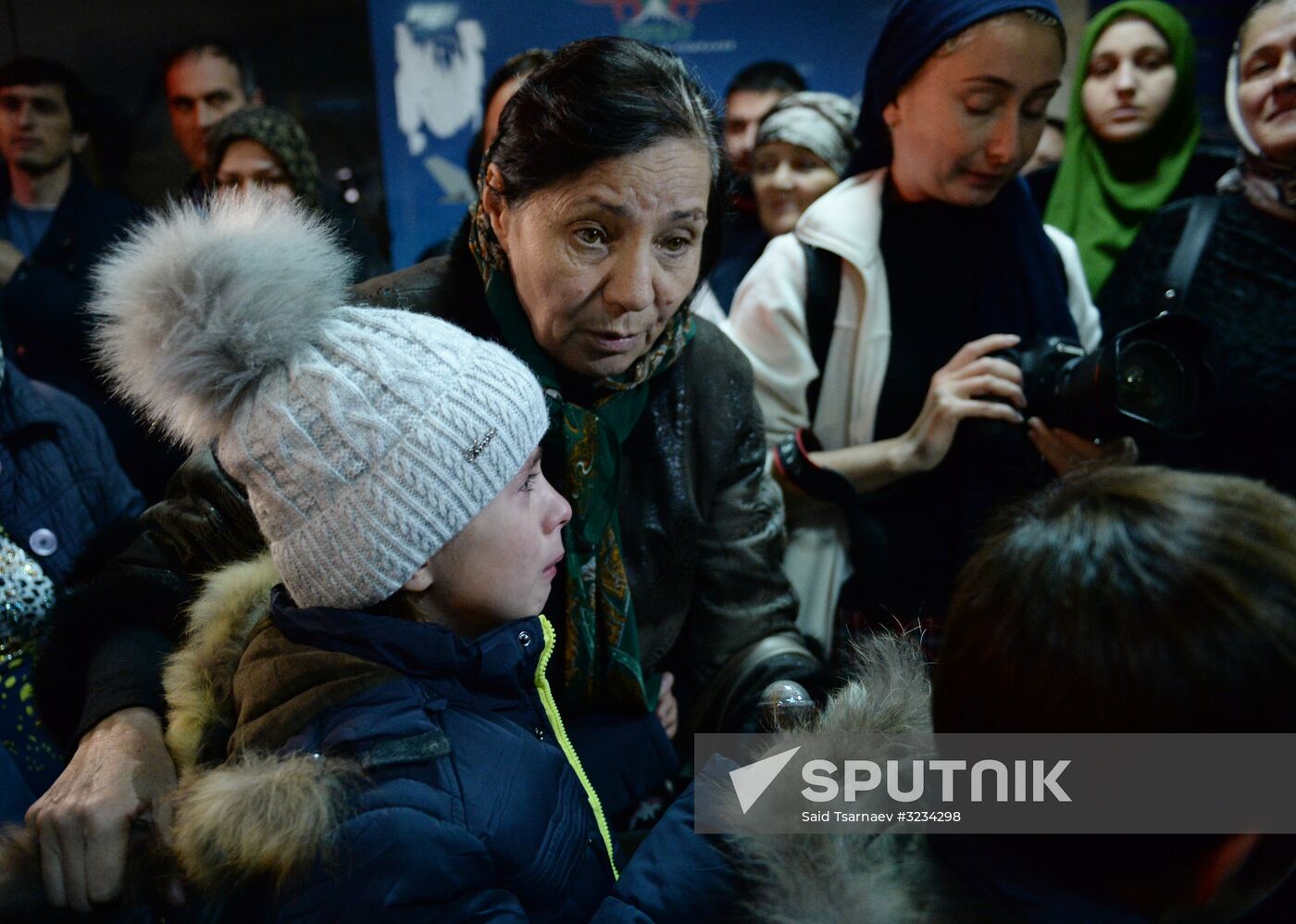Welcoming Russian children, rescued in Syria, at Grozny Airport