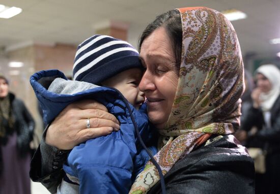 Welcoming Russian children, rescued in Syria, at Grozny Airport