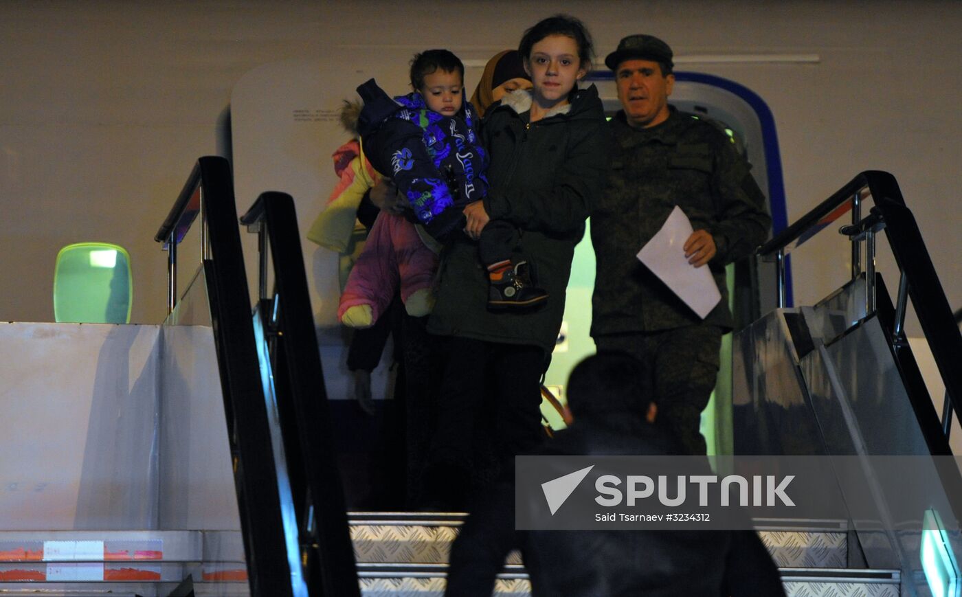Welcoming Russian children, rescued in Syria, at Grozny Airport