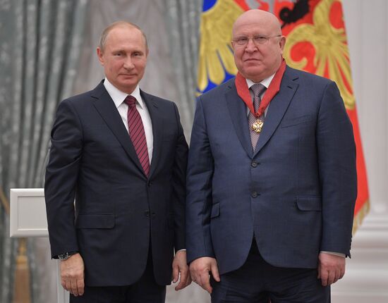 President Vladimir Putin presents state awards at the Kremlin