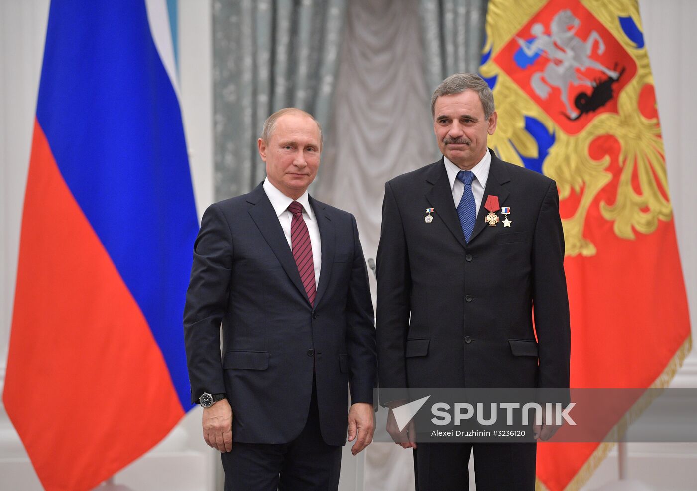 President Vladimir Putin presents state awards at the Kremlin