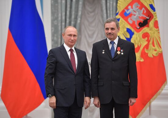 President Vladimir Putin presents state awards at the Kremlin