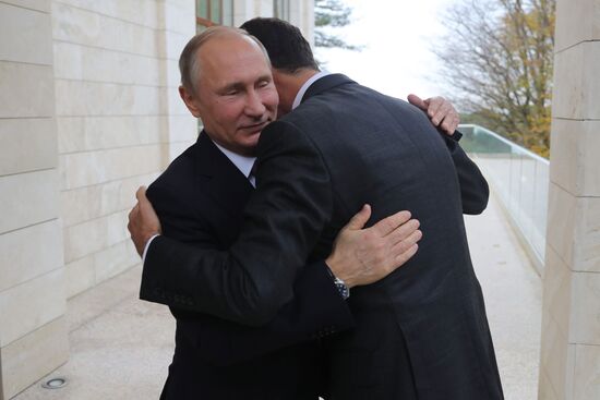 Vladimir Putin meets with Syrian President Bashar Al-Assad