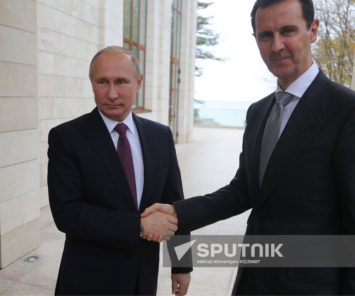 Vladimir Putin meets with Syrian President Bashar Al-Assad