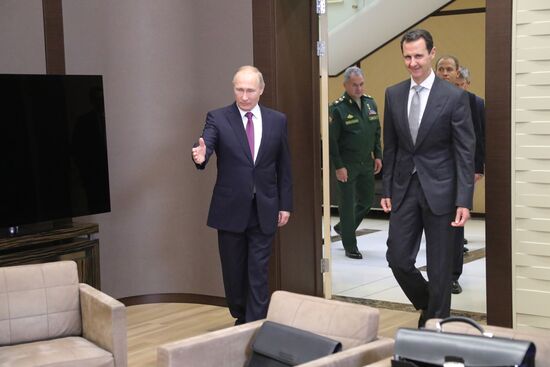 Vladimir Putin meets with Syrian President Bashar Al-Assad