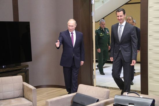 Vladimir Putin meets with Syrian President Bashar Al-Assad
