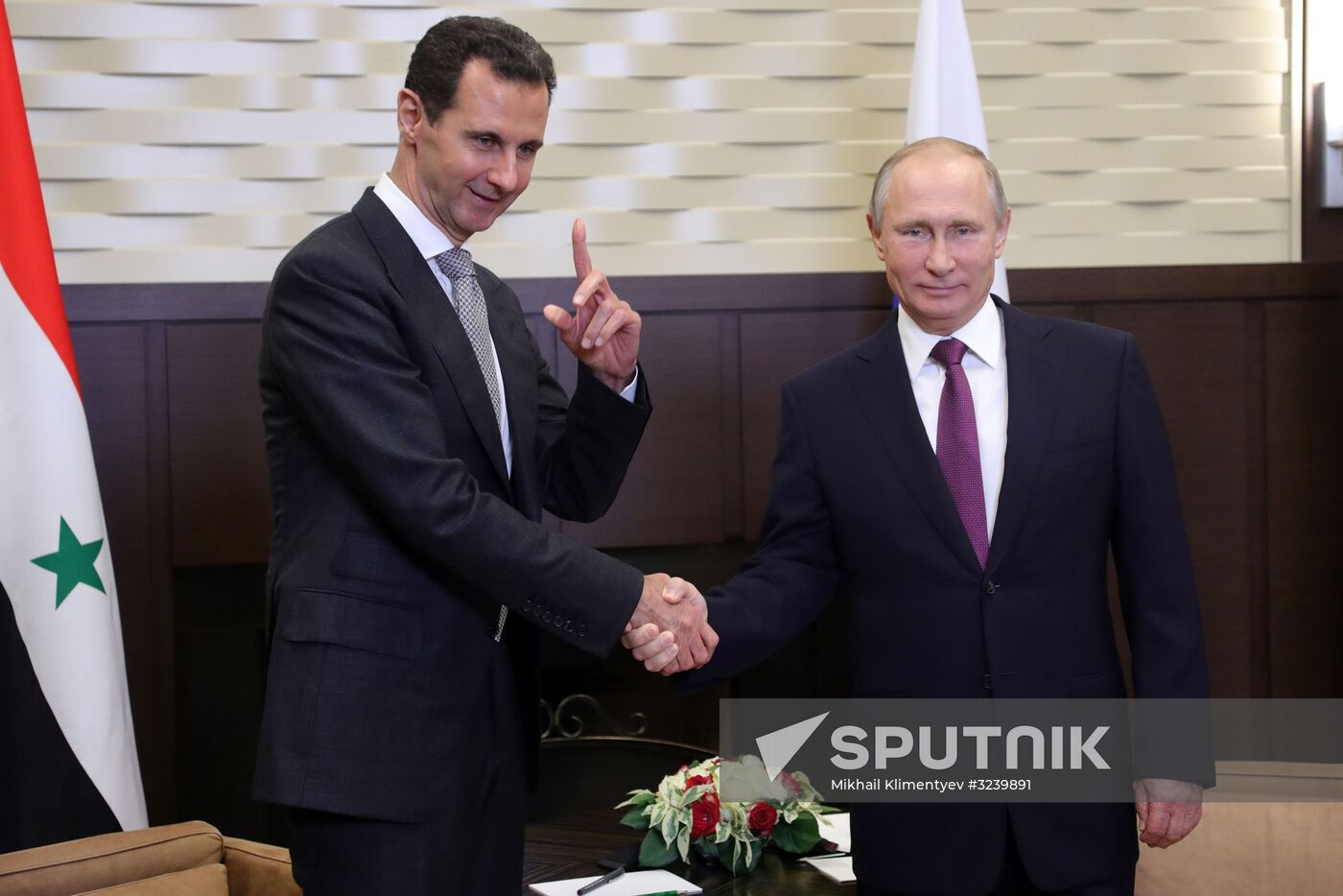 Vladimir Putin meets with Syrian President Bashar Al-Assad