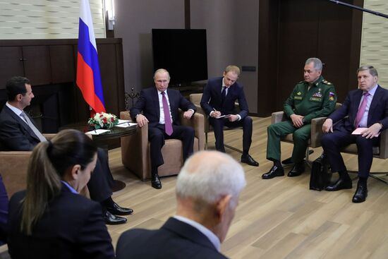 Vladimir Putin meets with Syrian President Bashar Al-Assad