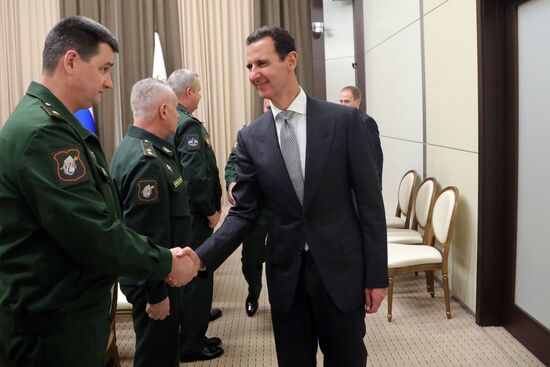 Vladimir Putin meets with Syrian President Bashar Al-Assad