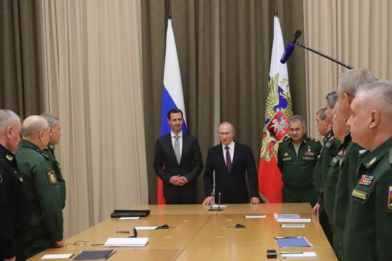 Vladimir Putin meets with Syrian President Bashar Al-Assad
