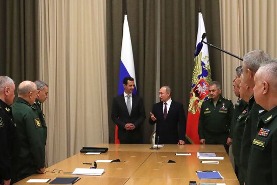 Vladimir Putin meets with Syrian President Bashar Al-Assad