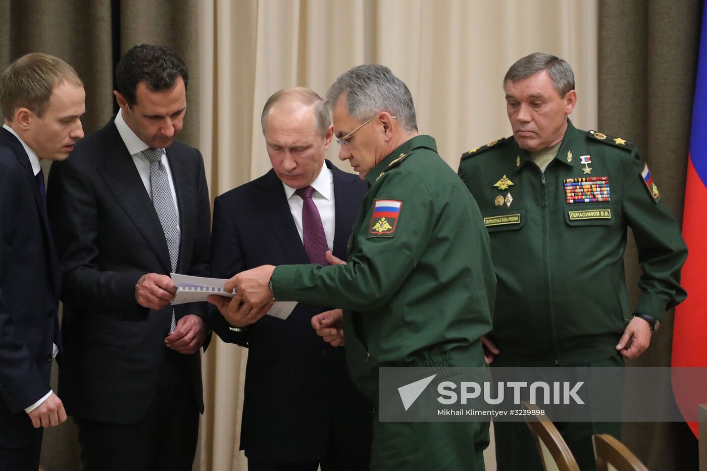 Vladimir Putin meets with Syrian President Bashar Al-Assad