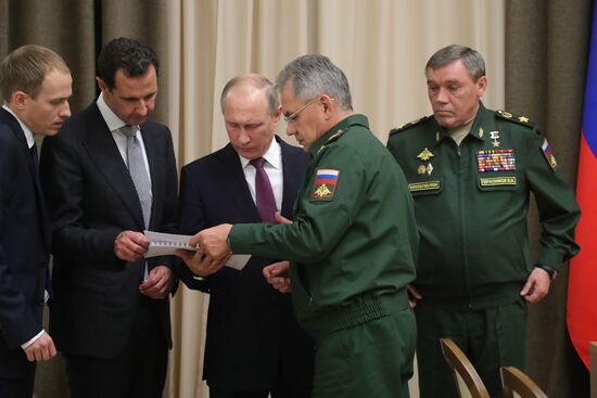 Vladimir Putin meets with Syrian President Bashar Al-Assad