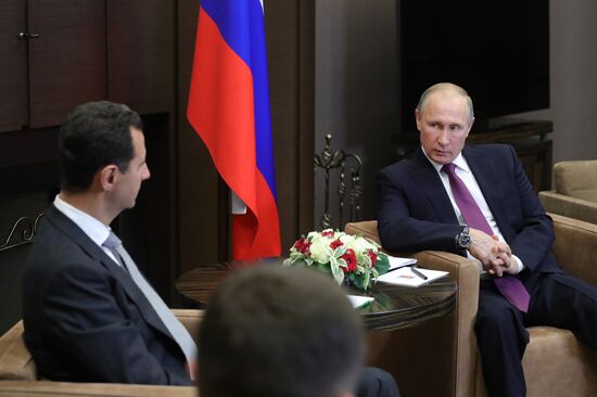 Vladimir Putin meets with Syrian President Bashar Al-Assad