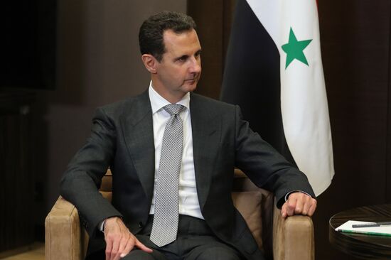 Vladimir Putin meets with Syrian President Bashar Al-Assad