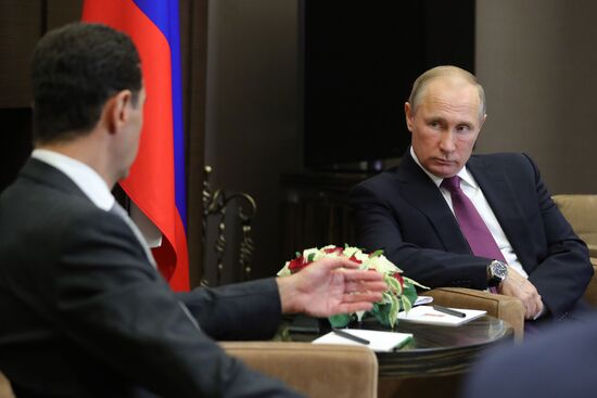 Vladimir Putin meets with Syrian President Bashar Al-Assad