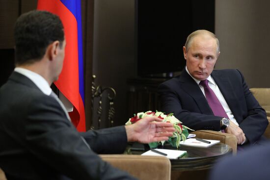 Vladimir Putin meets with Syrian President Bashar Al-Assad