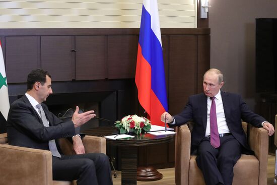 Vladimir Putin meets with Syrian President Bashar Al-Assad