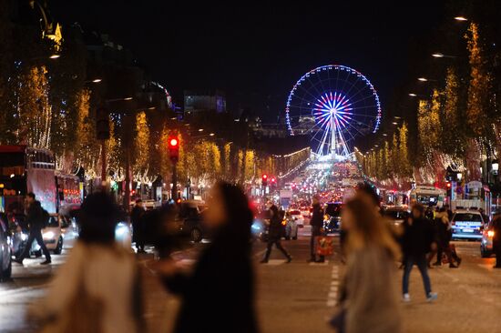 Christmas lights switched on Champs Elysees Avenue