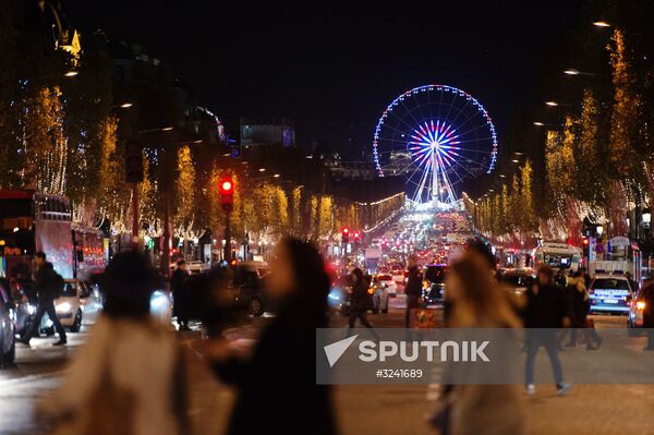 Christmas lights switched on Champs Elysees Avenue