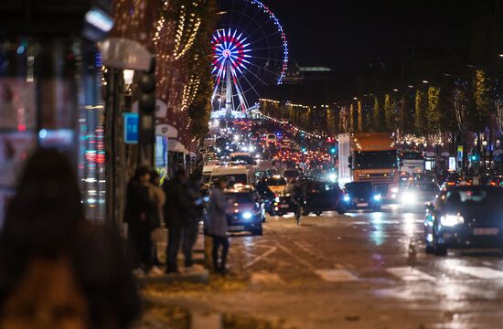 Christmasd lights switched on Champs Elysees Avenue