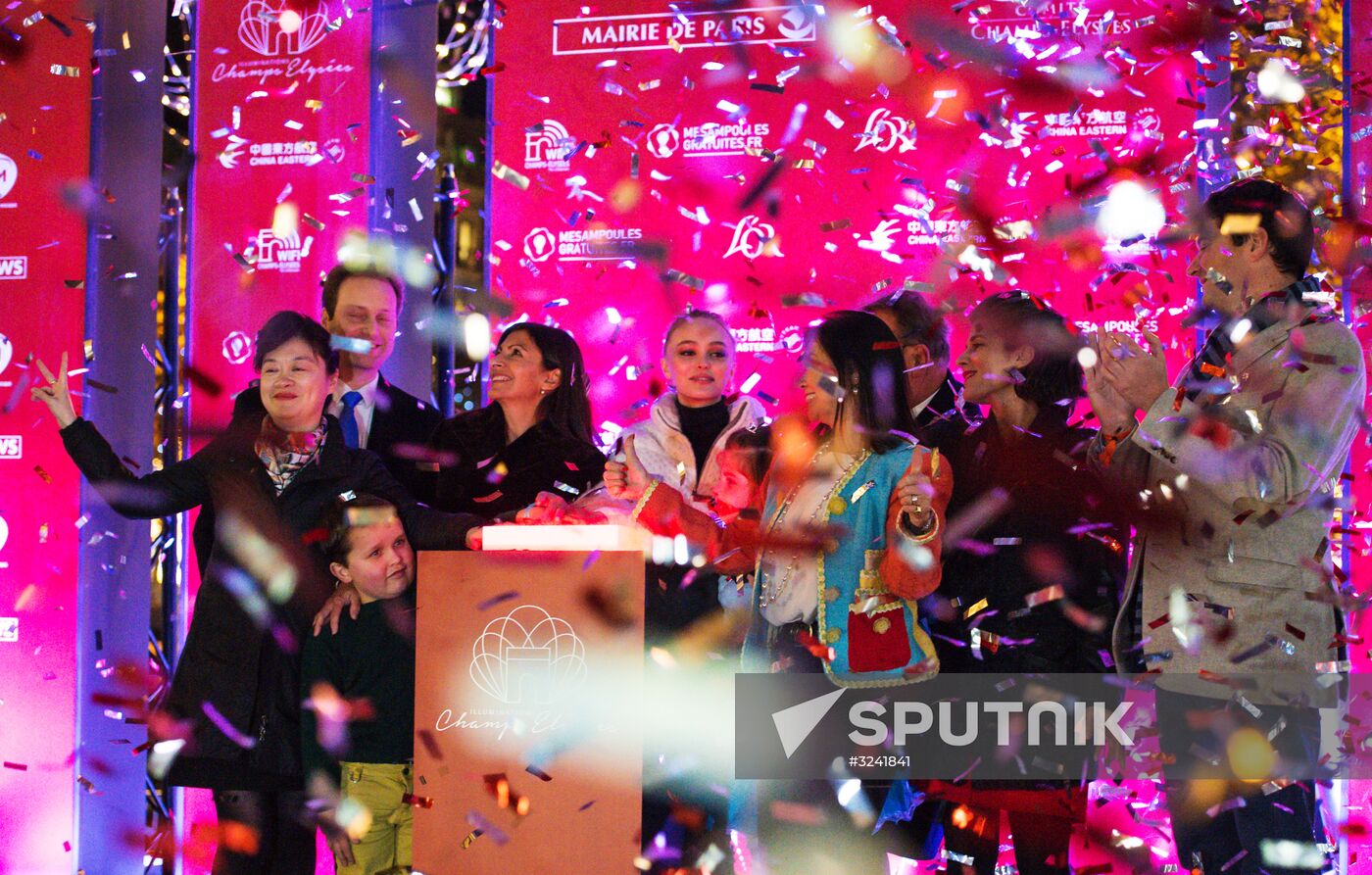 Christmas lights switched on Champs Elysees Avenue