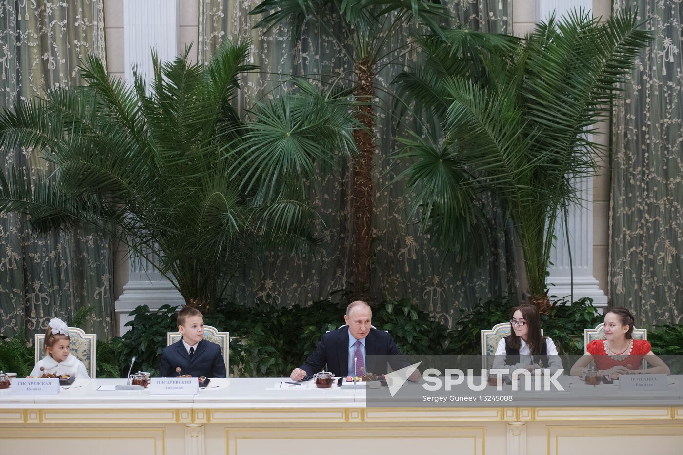 Russian President Vladimir Putin meets with winners of Family of the Year national contest