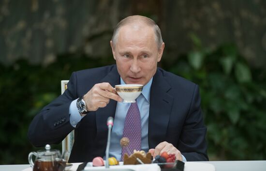 Russian President Vladimir Putin meets with winners of Family of the Year national contest