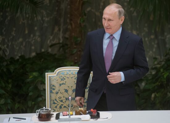 Russian President Vladimir Putin meets with winners of Family of the Year national contest