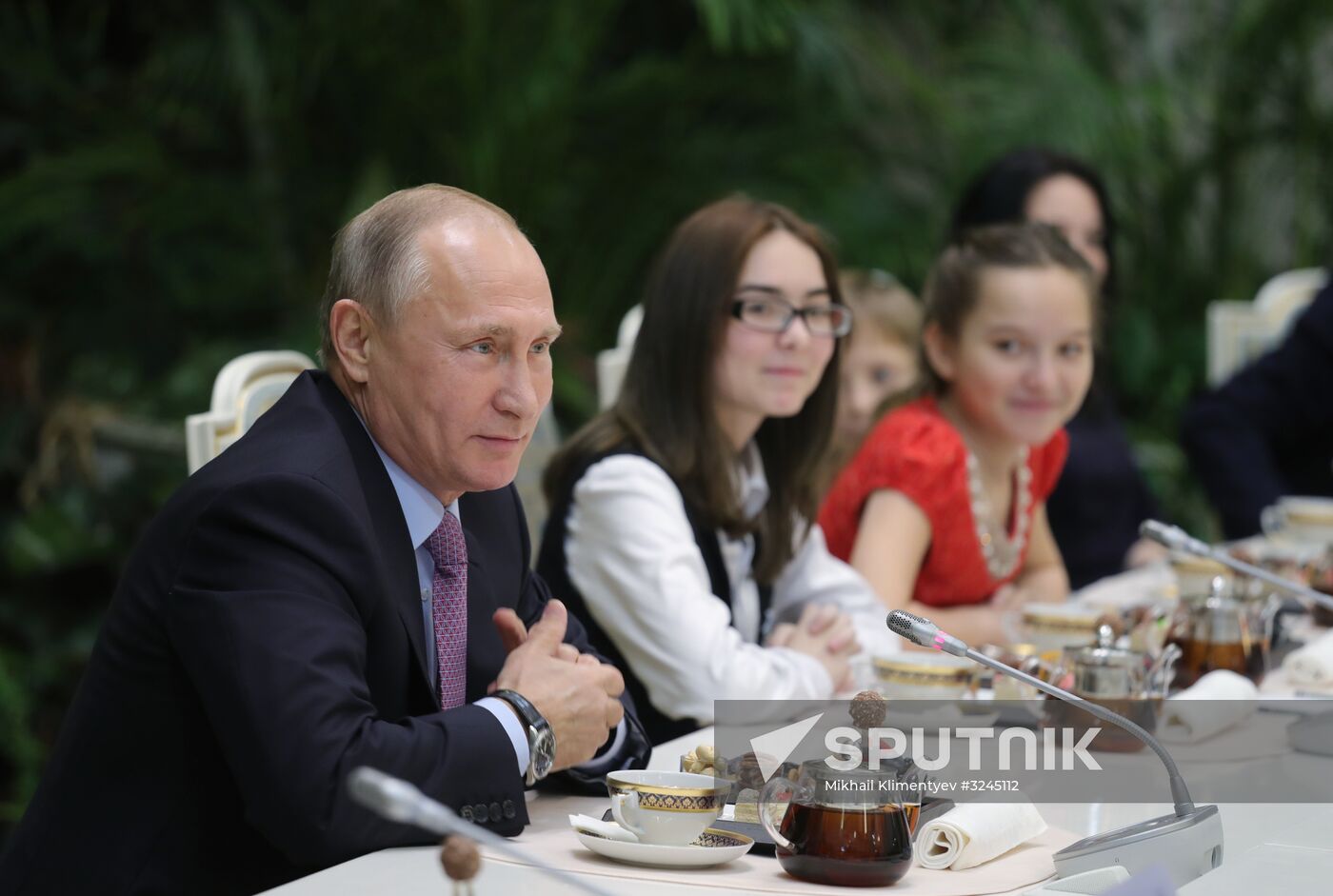 Russian President Vladimir Putin meets with winners of Family of the Year national contest